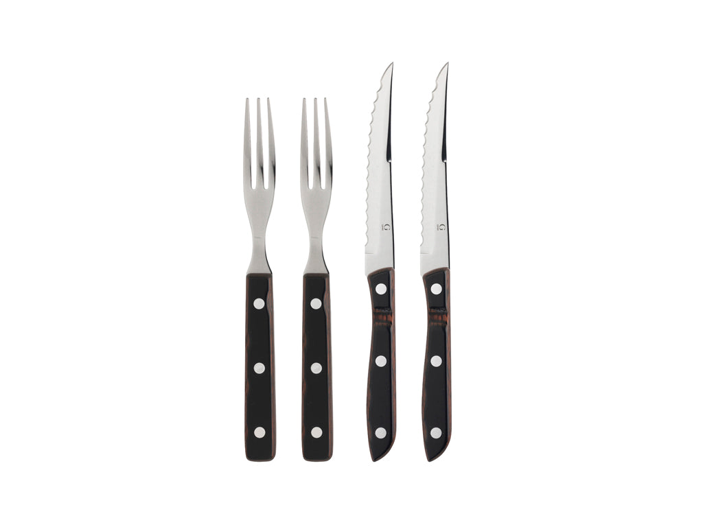 Sæt med fire dele bestående af to gaffel og to knive i rustfrit stål med sorte træhåndtag og hvide prikker