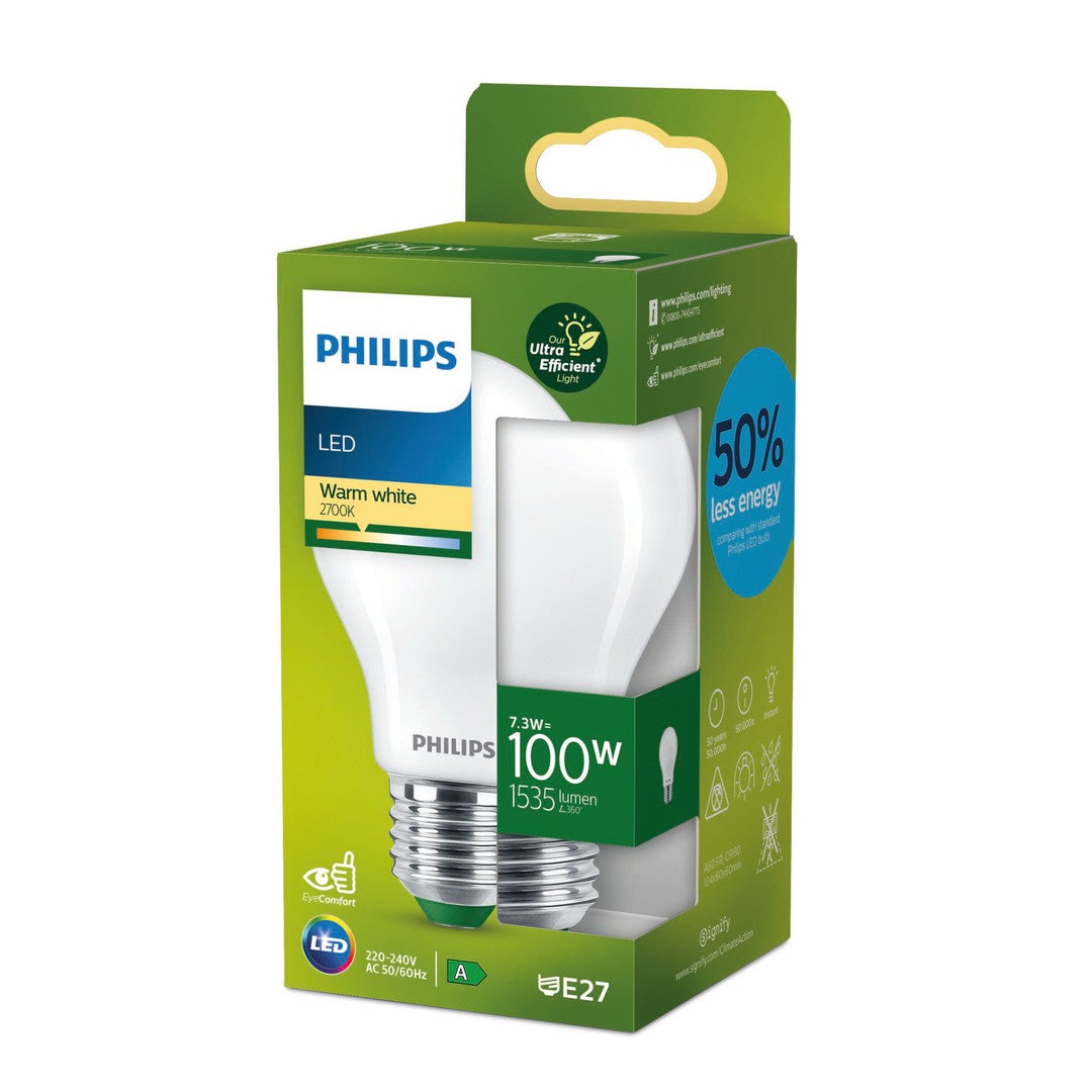 Billede af en PHILIPS LED pære i A70 format med E27 sokkel og 100W effekt pakket i en farverig æske med informationer om varme hvid belysning 2700K og energibesparelse på 50 procent samt en levetid på 50000 timer