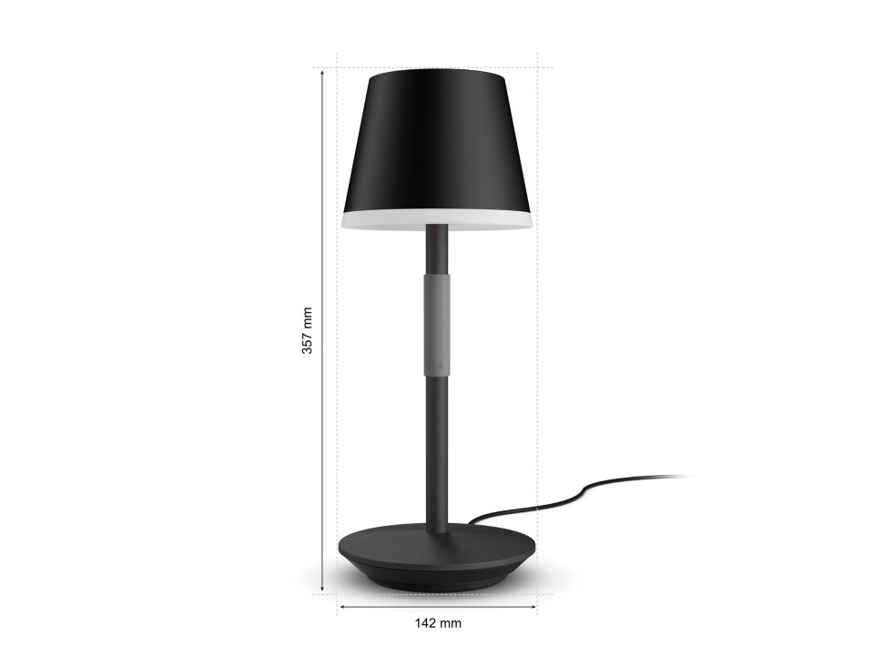 Billede af Philips Hue Go bærbar bordlampe i sort med målene 357 mm i højden og 142 mm i bredden, designet med et moderne og stilrent udseende, inklusive en lampefod og en skærm der giver blødt lys.