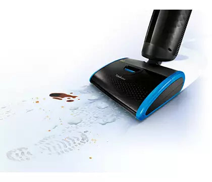 Philips FC7088/01 AquaTrio Pro der viser børsten, der rengør gulvet med vand og fjerner pletter og snavs