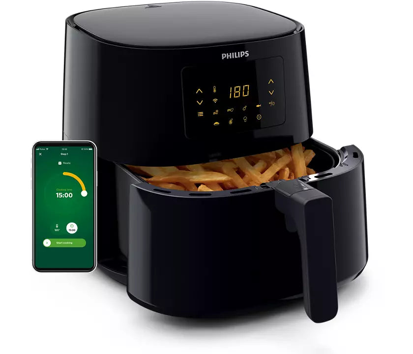 Philips HD9280/90 Connected Airfryer XL med en kapacitet på 1,2 kg og 6,2 l fra 5000-serien med skærm og en smartphone ved siden af som viser madlavningstimeren