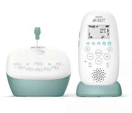 Billede af Philips Avent SCD731/26 DECT-babyalarm med en baseenhed og en håndholdt enhed. Baseenheden har en grøn bund og kontrolknapper til funktioner som musikafspilning og lydenhed. Håndholdt enhed viser temperatur og har knapper til menu og funktioner.