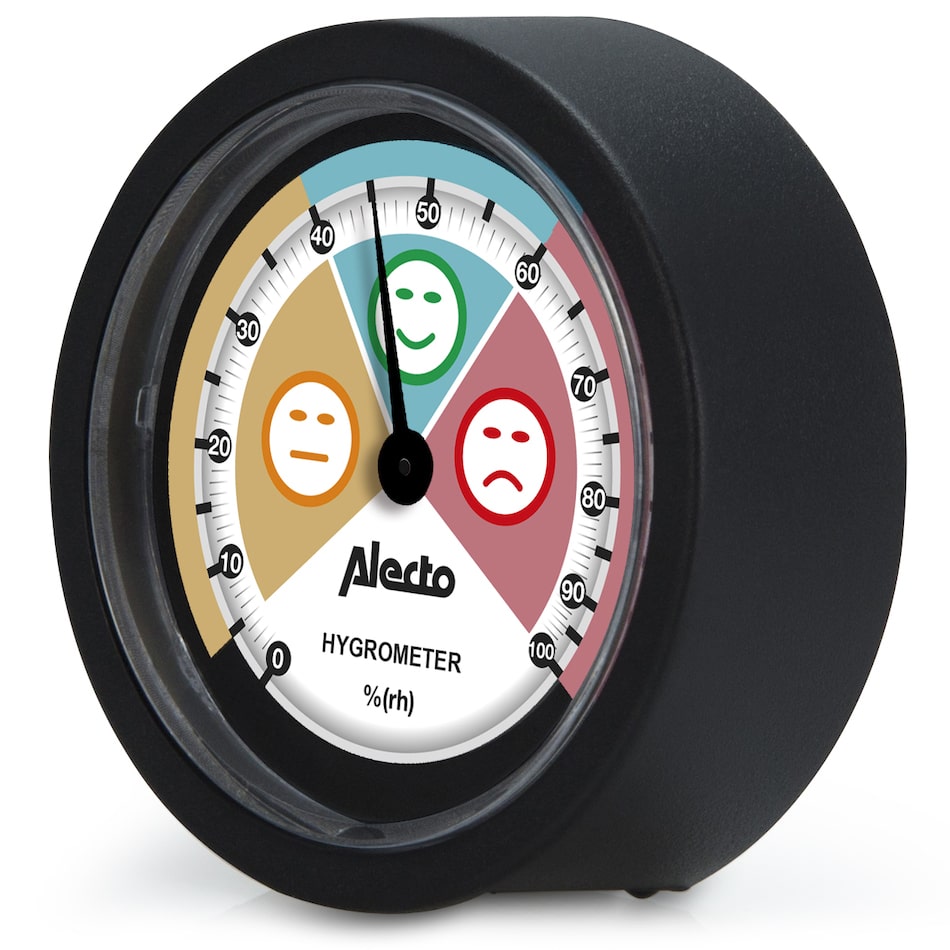 Hygrometer Alecto WS-05 med en rund sort ramme og en viser der angiver fugtighedsniveauet på en farverig skala med smilende og utilfredse ansigtstræk