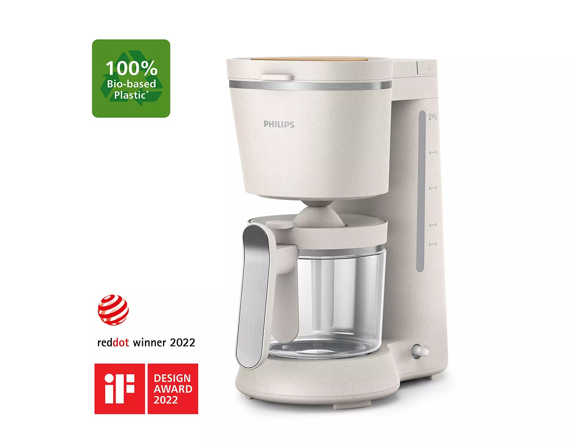 Billede af Philips HD5120/00 Eco Conscious Edition filterkaffemaskine i en lys, naturlig farve lavet af 100 procent bio-baseret plastik med en glaskande placeret foran og tydelige målelinjer på siden, der viser kapaciteten. Produktet har vundet Red Dot Design Award 2022 og IF Design Award 2022.