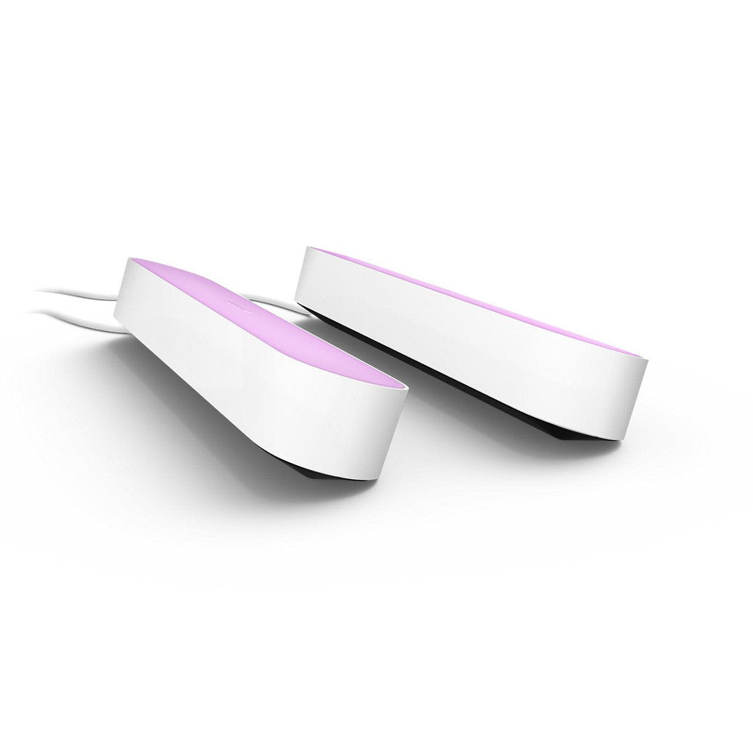 Philips Hue White and color ambiance Play Double Pack i hvid med to slanke lamper der har en top i lyserød farve og et elegant design velegnet til moderne indretning