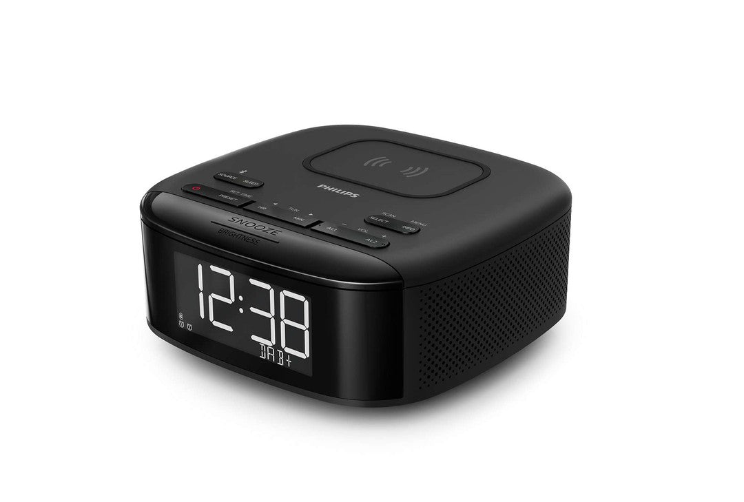 Philips TAR7705/10 vækkeur med digital skærm og trådløs opladning designet i sort farve klokkeslæt viser 12:38 med knapper til snooze og lysjustering