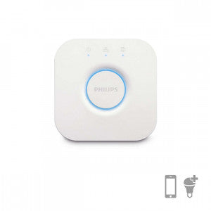 Philips HUE Bridge i hvidt med en rund midterknap og tre indikatorlamper på toppen samt symboler for mobiltelefon og pære i hjørnet