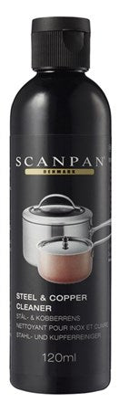 Scanpan kobber- og stålrens i en 120 ml flaske med sort etiket og guldbogstaver viser en gryde i stål og en gryde i kobber som illustration på forsiden