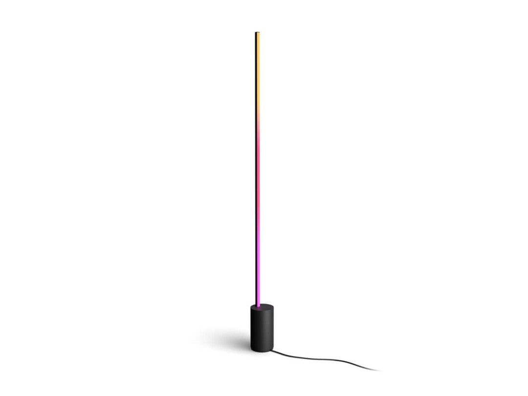 Philips HUE Signe gradient gulvlampe med sort base og farveskiftende lys i en slank, moderne design med en høj vertical stang