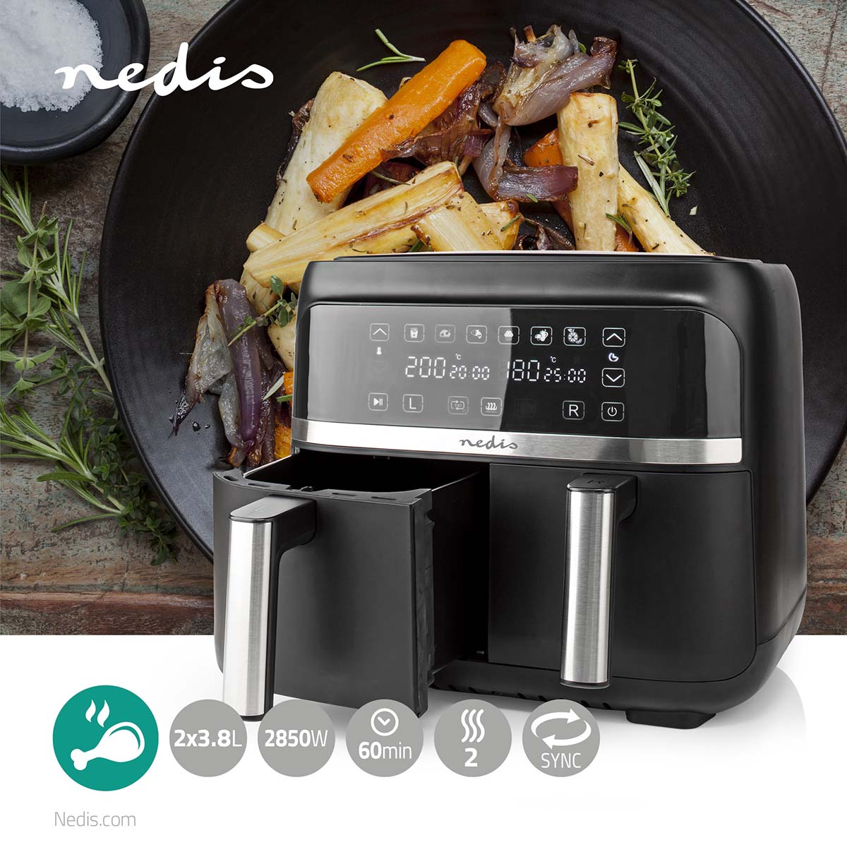 Nedis KAAFD350EBK Airfryer med to skuffer på 3,8 liter hver digital timer op til 60 minutter og 2850 watt kapacitet foran en skål med grøntsager fyldt med rosmarin