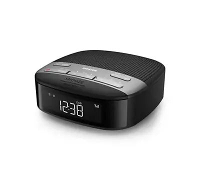 Philips TAR3505/12 vækkeur med integreret radio i sort design, der viser tiden tydeligt på en LCD-skærm med store tal og knapper til betjening for volumen og snooze funktioner.