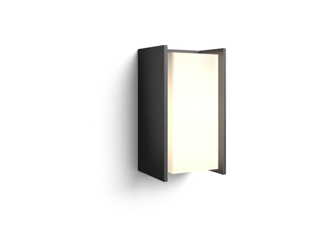 Philips HUE Turaco udendørs væglampe med en moderne design i mørk metal og oplyst lyssektion som giver et varmt og indbydende skær til udendørs rum