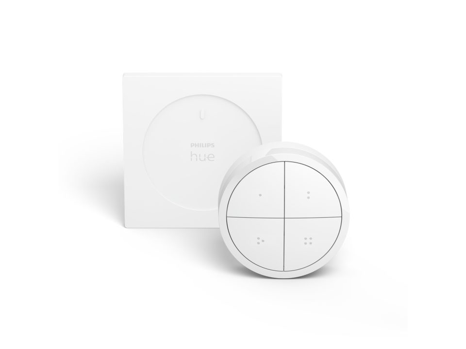 Philips Hue Tap dial switch i hvid farve med fire knapper og oval kontrolplade i en moderne design.