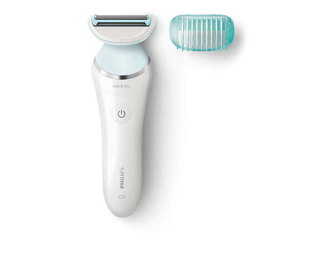 Philips BRL130/00 Ladyshaver SatinShave Advanced med glat hvidt design og en enkelt betjeningstast samt en aftagelig blå kam til trimning ved siden af