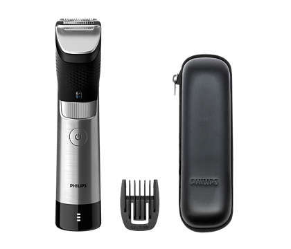 Philips BT9810/15 skægtrimmer 9000 Prestige med en sort og sølvfarvet designdel samt et tilbehør som en klippeskabelon og et sort etui