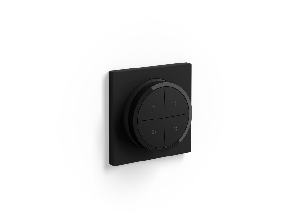 Philips Hue Tap dial switch sort med fire interaktive knapper på en sort baggrund designet til at styre belysning i hjemmet