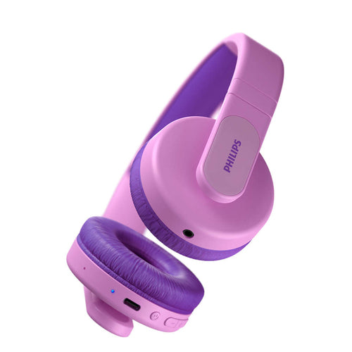 Trådløse on-ear hovedtelefoner til børn fra Philips i lyserød og lilla farve med bløde ørepuder og knapper til volumen og strøm på siden