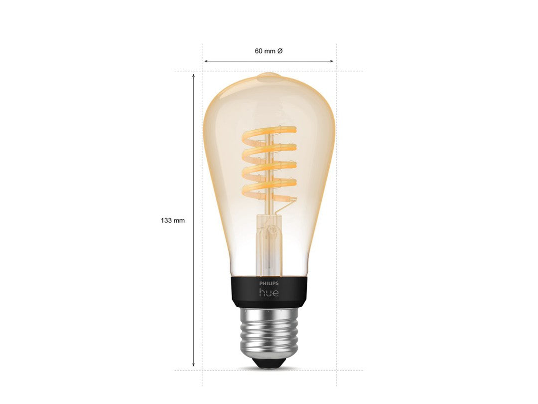 Billede af Philips Hue White Ambiance Filament Edison ST64 E27 pære med en diameter på 60 mm og en højde på 133 mm synlig i transparent design med synlige filamenter og en sort base