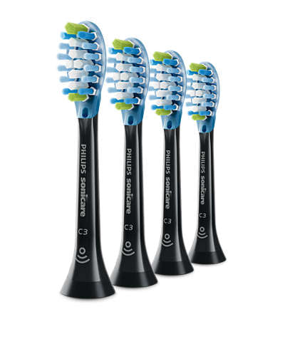 Fire Philips Sonicare C3 Premium Plaque Defence tandbørstehoveder i blå og sort med grønne detaljer, designet til at fjerne plak effektivt og forbedre tandrensningen