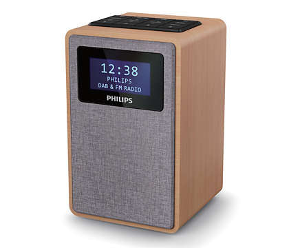 Philips TAR5005/10 DAB+ radio i lys træ med tekstur og digitalt display som viser tiden og navnet Philips DAB og FM radio