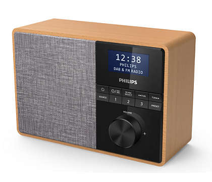 Philips TAR5505/10 DAB+ radio med Bluetooth i lys træfinish med en grå højttalerskærm og sort kontrolpanel samt digital skærm der viser klokkeslæt og radioindstillingsinformation