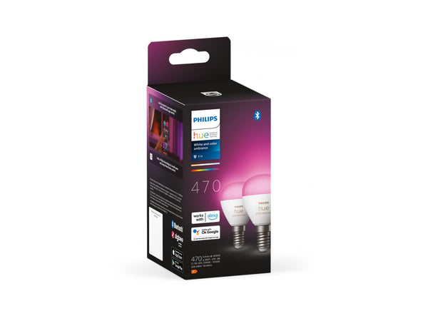 Pakke med to Philips Hue Krone E14 pærer i hvid og farvet lys med Bluetooth og Zigbee kompatibilitet. Forsiden viser produktnavn og funktioner samt energimærkning.